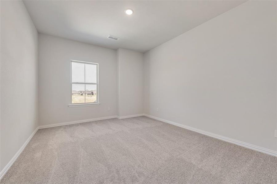 Spacious, unfurnished interior of a new home in Spiritas Ranch, Little Elm (Image 24).