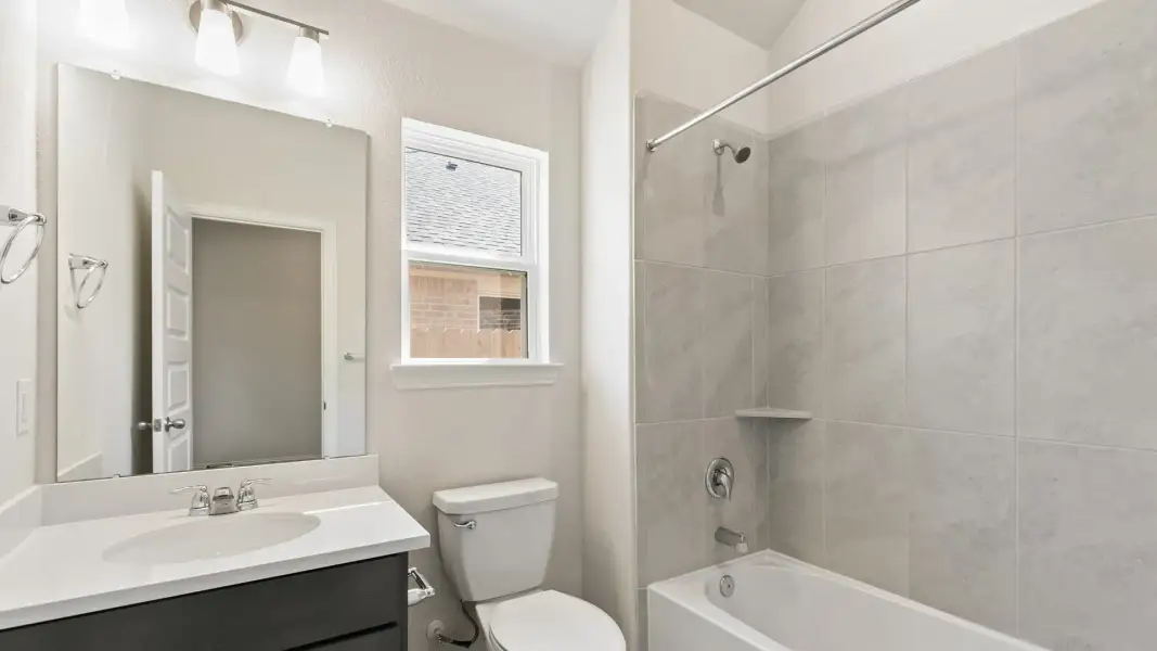Furnished interior view inside a new home in Oakwood Estates, Waller (Image 5).