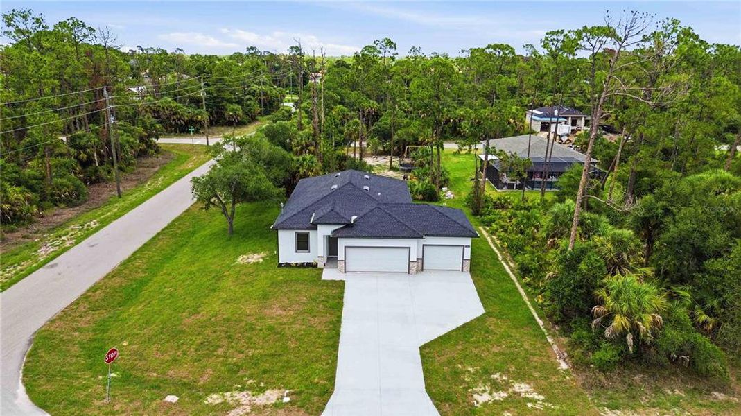 Front exterior of a new home in , Port Charlotte, FL, highlighting curb appeal (Image 21). Front exterior of a new home in , Port Charlotte, FL, highlighting curb appeal (Image 21).