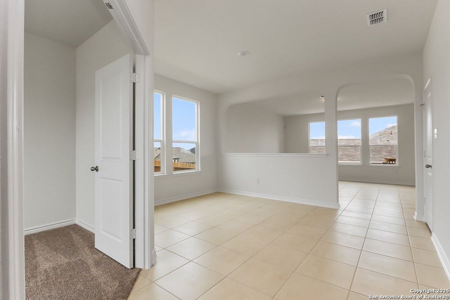 Spacious, unfurnished interior of a new home in Hidden Bluffs at TRP, San Antonio (Image 6).