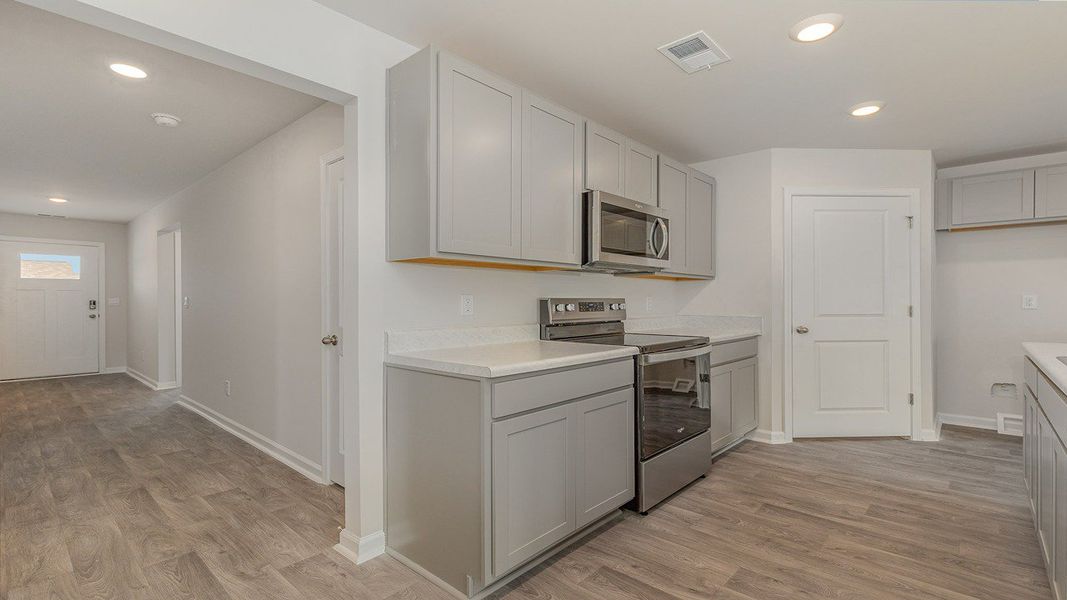 Representative furnished interior of a home built from the DOVER-EXPRESS by D.R. Horton in Stanbury Creek, Supply (Image 10).