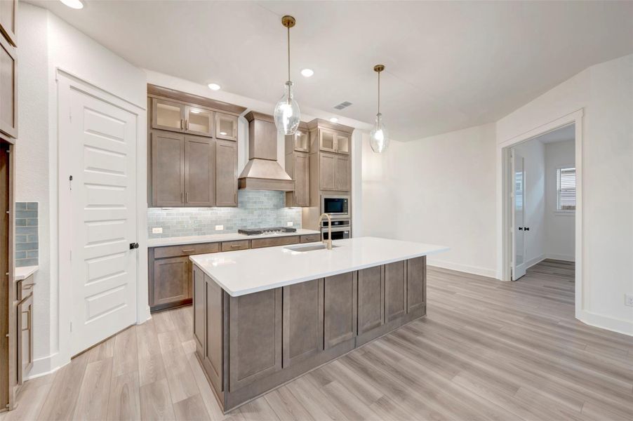 Furnished interior view inside a new home in Elyson 45', Katy (Image 11).