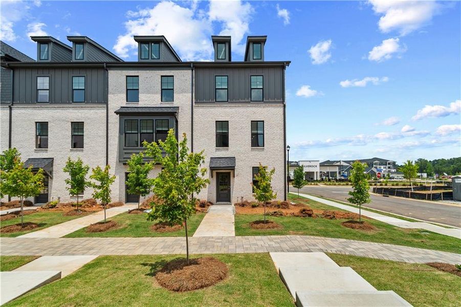 Front exterior of a new home in Silverock, McDonough, GA, highlighting curb appeal (Image 24).