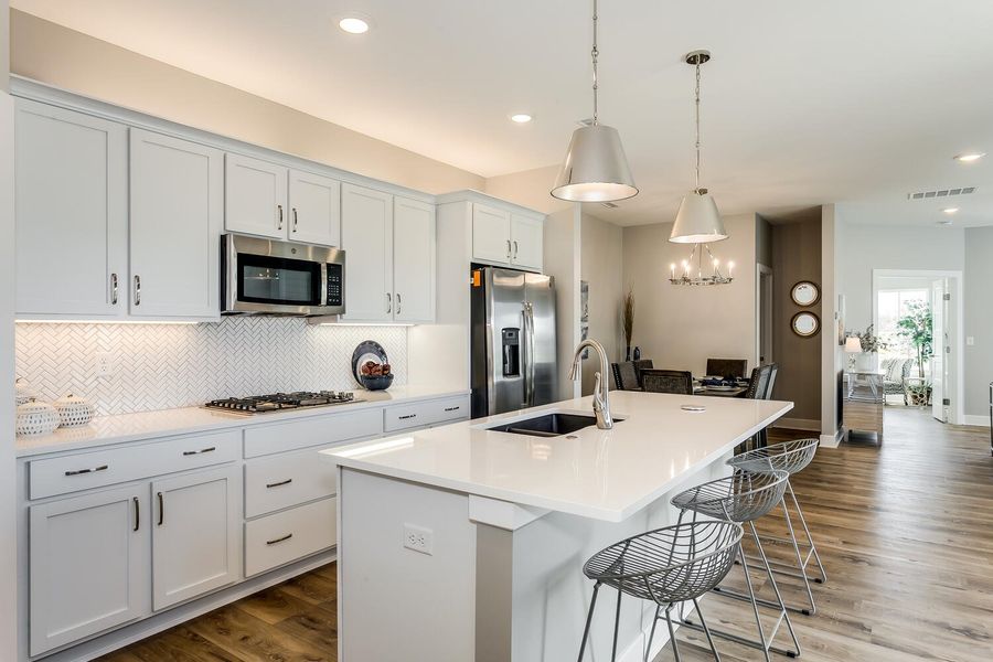 Representative furnished interior of a home built from the Redwood by Perfection Builders in Heritage Commons, Andover (Image 5).