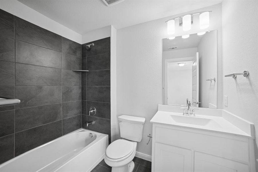 Furnished interior view inside a new home in Karis - Village Series, Crowley (Image 8). Furnished interior view inside a new home in Karis - Village Series, Crowley (Image 8).