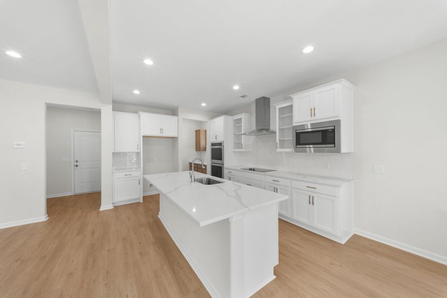 Representative furnished interior of a home built from the The Madison by Smith Family Homes in Camden Crossing, Savannah (Image 6).