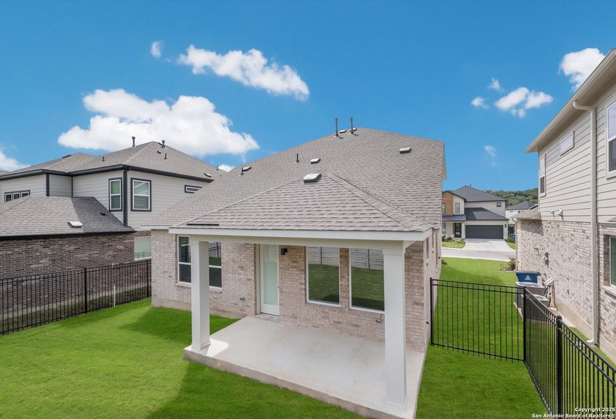 Exterior details and patio area of a home in Crown Ridge Manor, San Antonio (Image 18).