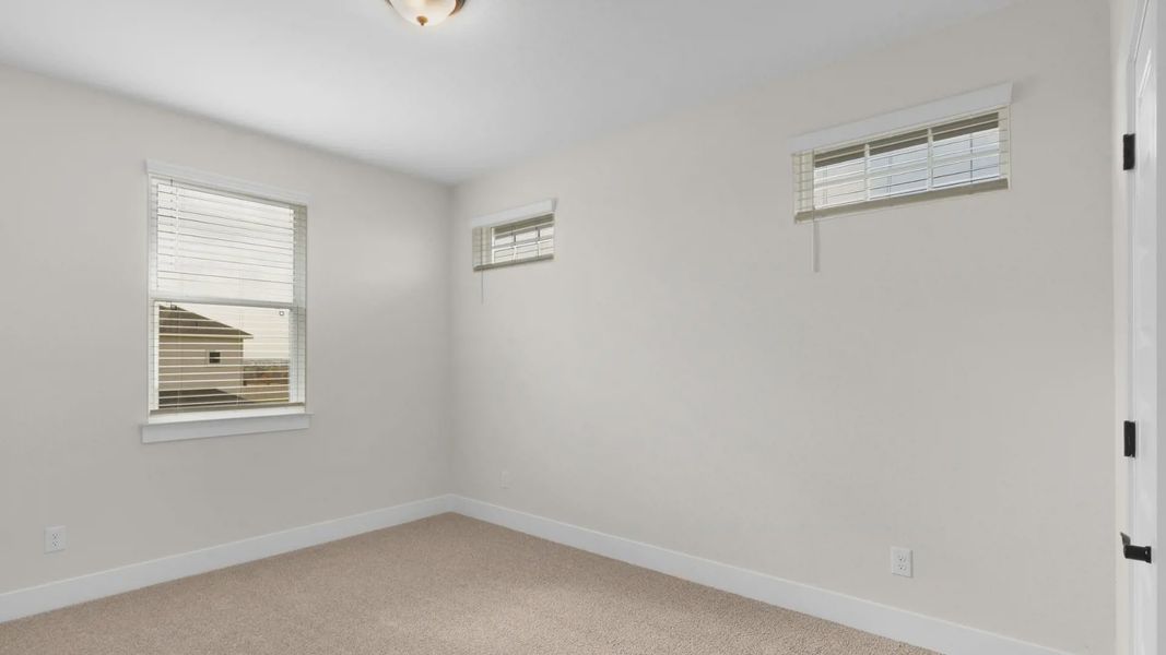 Spacious, unfurnished interior of a new home in The Grove at Blackhawk, Pflugerville (Image 19).