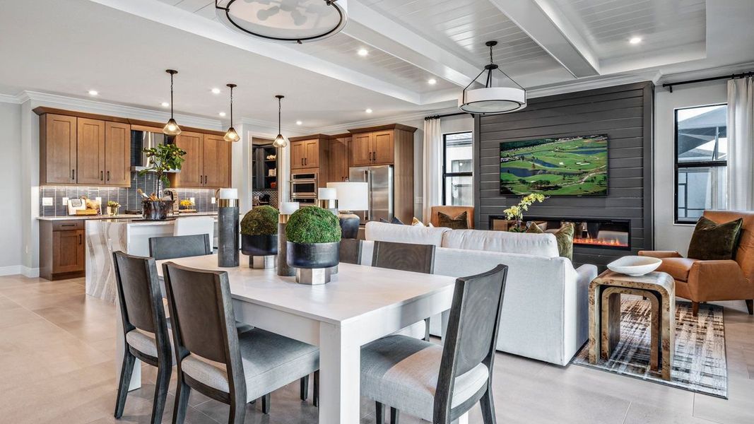 Laura Model Home | Dining & Great Room - Model shown is from sister community