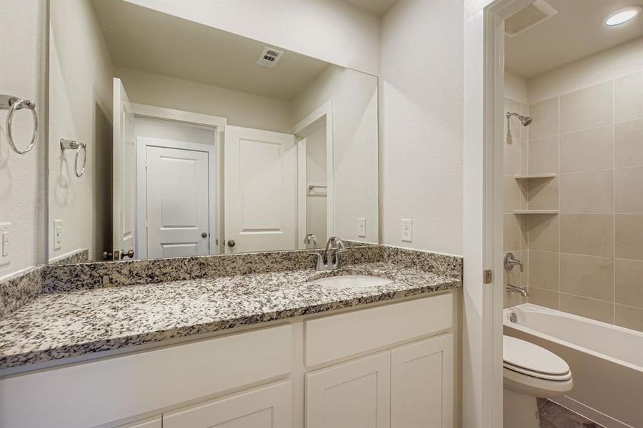 Furnished interior view inside a new home in Sperling Farms, Ferris (Image 7).