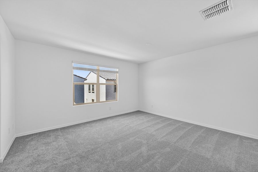 Spacious, unfurnished interior of a new home in Artisan at Asante, Surprise (Image 20).