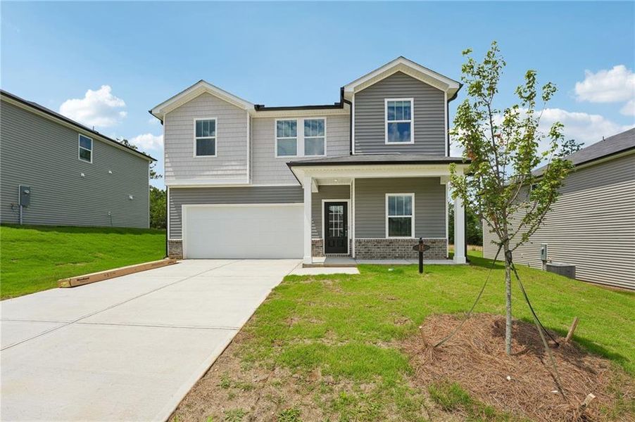 Front exterior of a new home in Manning Mill, Adairsville, GA, highlighting curb appeal (Image 1). Front exterior of a new home in Manning Mill, Adairsville, GA, highlighting curb appeal (Image 1).
