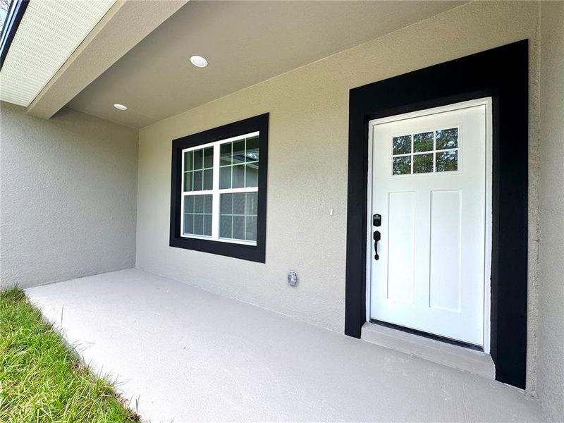 Exterior details and patio area of a home in , Citrus Springs (Image 24).