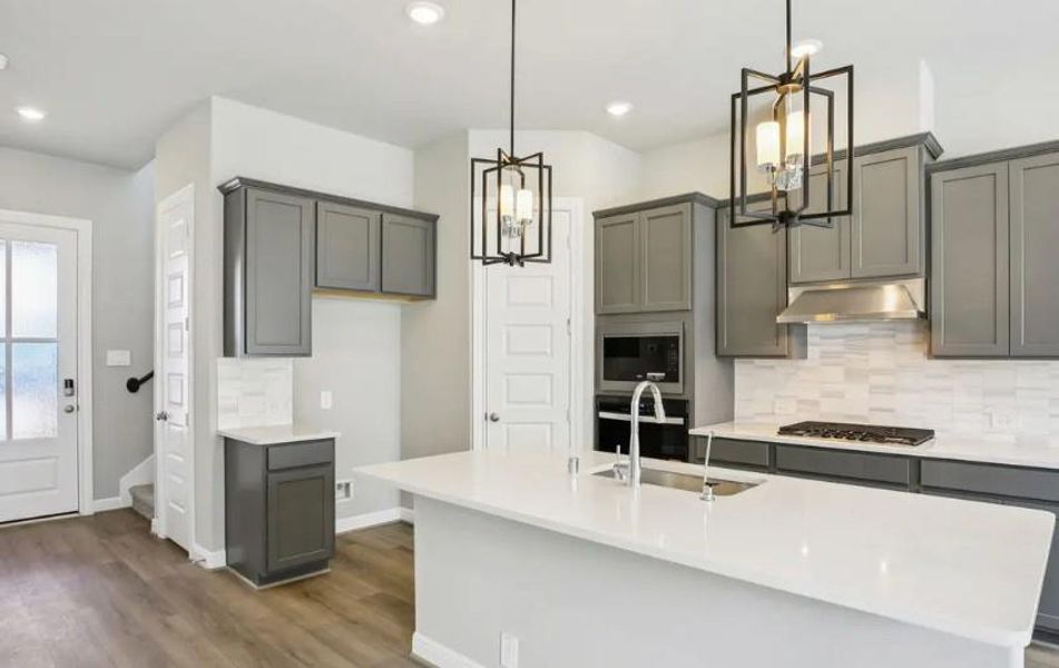 Photo is not of the actual home, but is an inspirational photo of builder’s model home and may depict options, furnishings, and/or decorator features that are not included Photo is not of the actual home, but is an inspirational photo of builder’s model home and may depict options, furnishings, and/or decorator features that are not included