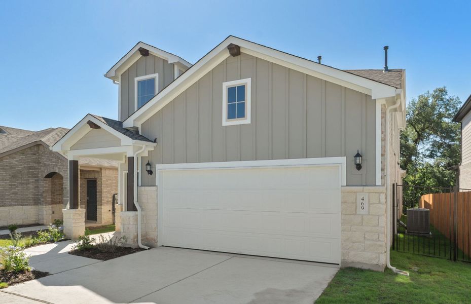 Front exterior of a new home in Saddleback at Santa Rita Ranch, Liberty Hill, TX, highlighting curb appeal (Image 20).