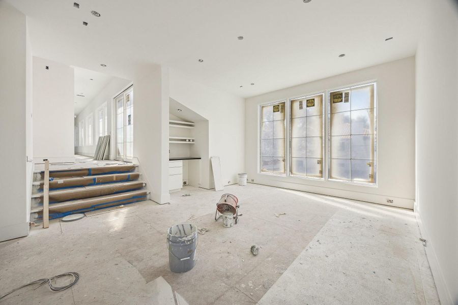 In-progress construction of a new home in , West University Place, TX (Image 11).