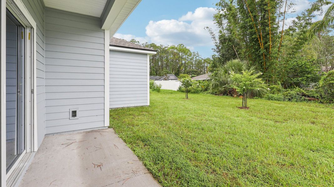 Exterior details and patio area of a home in Palm Coast, Palm Coast (Image 3).