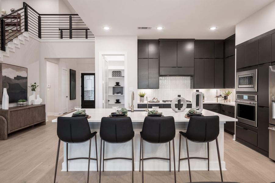 Representative furnished interior of a home built from the Barnhart by Tri Pointe Homes in Pecan Ridge, Fulshear (Image 12). Representative furnished interior of a home built from the Barnhart by Tri Pointe Homes in Pecan Ridge, Fulshear (Image 12).