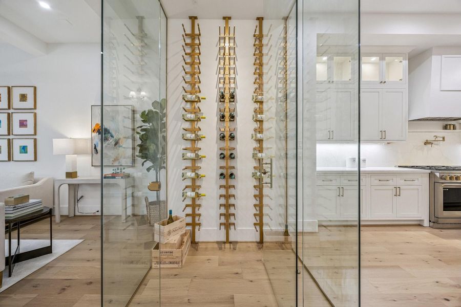 Floor-to-Ceiling Glass Enclosed Wine Room with Two System Display Holders for a Total of 138 Bottle Capacity from Wine Racks America. The Wine Racks are finished in a Golden Bronze and there is a 10 ft. Height Access Door (with a key lock included). Floor-to-Ceiling Glass Enclosed Wine Room with Two System Display Holders for a Total of 138 Bottle Capacity from Wine Racks America. The Wine Racks are finished in a Golden Bronze and there is a 10 ft. Height Access Door (with a key lock included).