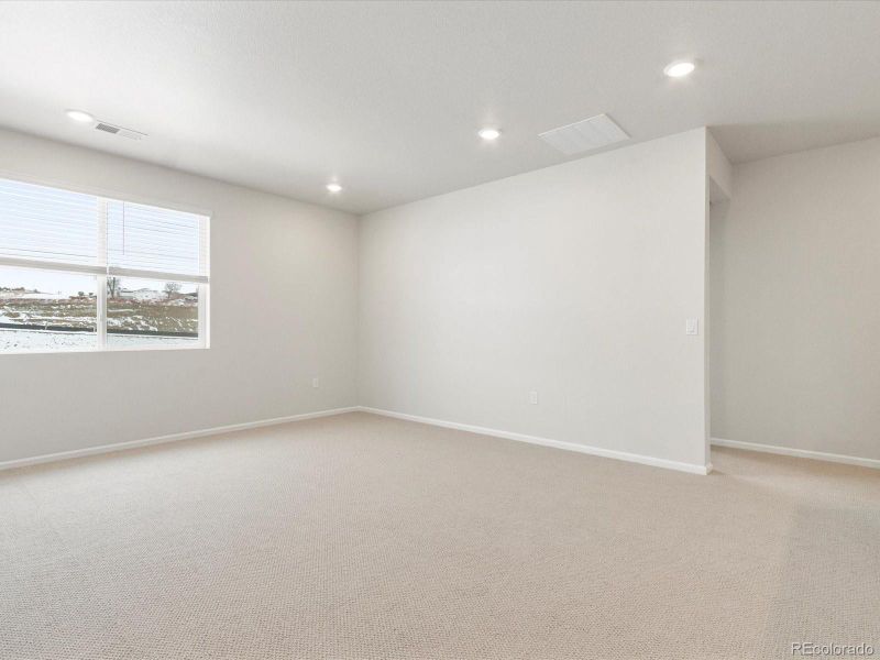 Spacious, unfurnished interior of a new home in Poudre Heights: The Alpine Collection, Windsor (Image 30).