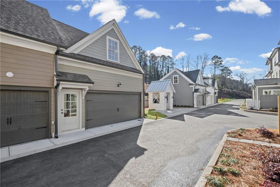Front exterior of a new home in , Ball Ground, GA, highlighting curb appeal (Image 17).