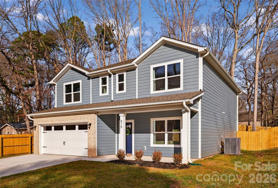 Front exterior of a new home in , Waxhaw, NC, highlighting curb appeal (Image 25).