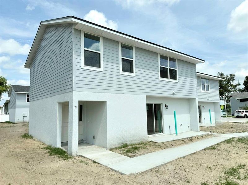 Front exterior of a new home in , Lakeland, FL, highlighting curb appeal (Image 2). Front exterior of a new home in , Lakeland, FL, highlighting curb appeal (Image 2).