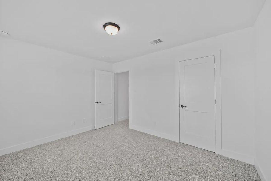 Spacious, unfurnished interior of a new home in Grange, Katy (Image 34).