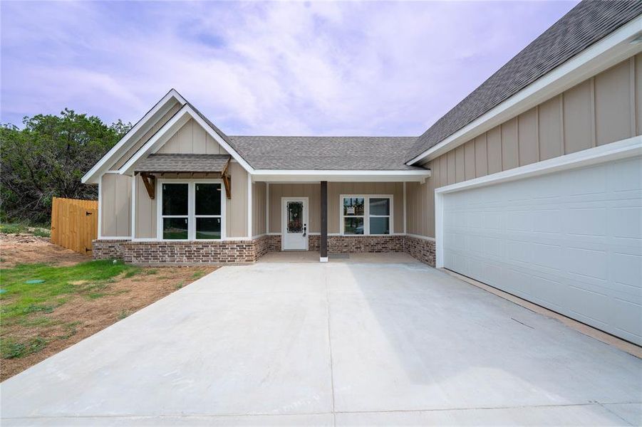 View of front of home featuring a garage