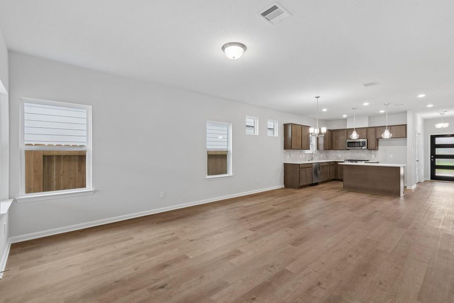 The Kettering II- Family Room into Dining Area and Kitchen