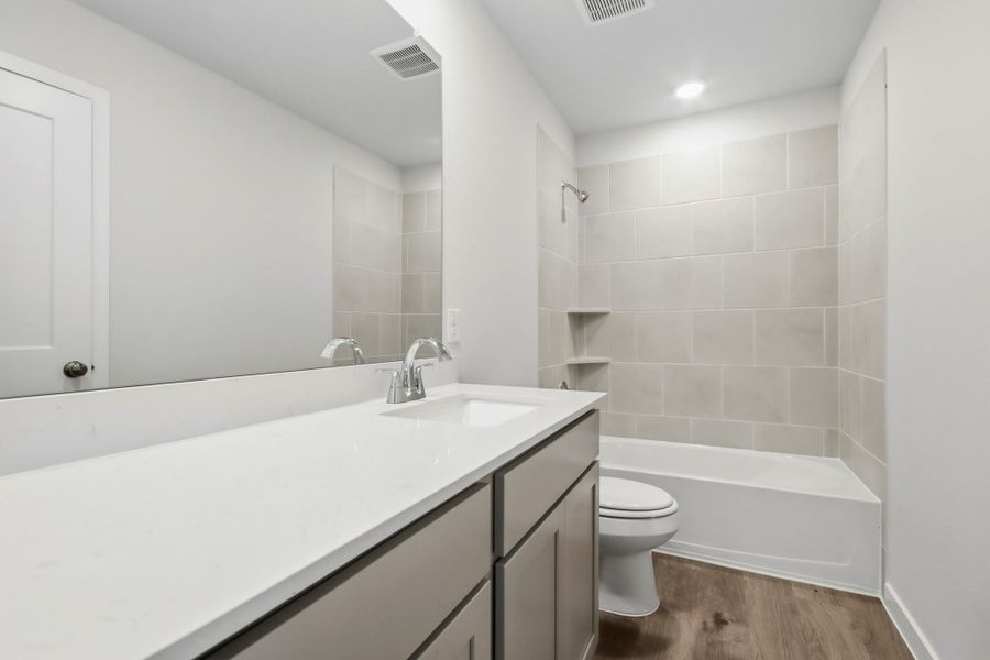 Furnished interior view inside a new home in Caney Mills, Conroe (Image 7). Furnished interior view inside a new home in Caney Mills, Conroe (Image 7).