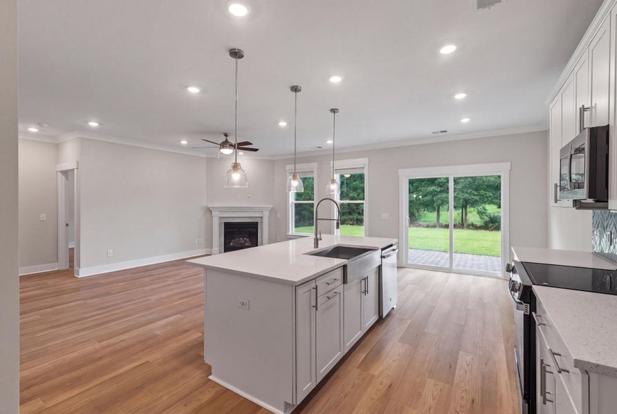 Furnished interior view inside a new home in Academy Park, Beaufort (Image 7).