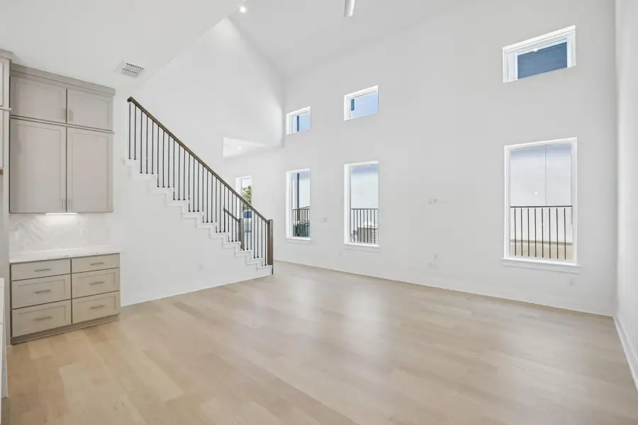 Spacious, unfurnished interior of a new home in Saddle Ridge at Wildhorse Ranch, Manor (Image 13).