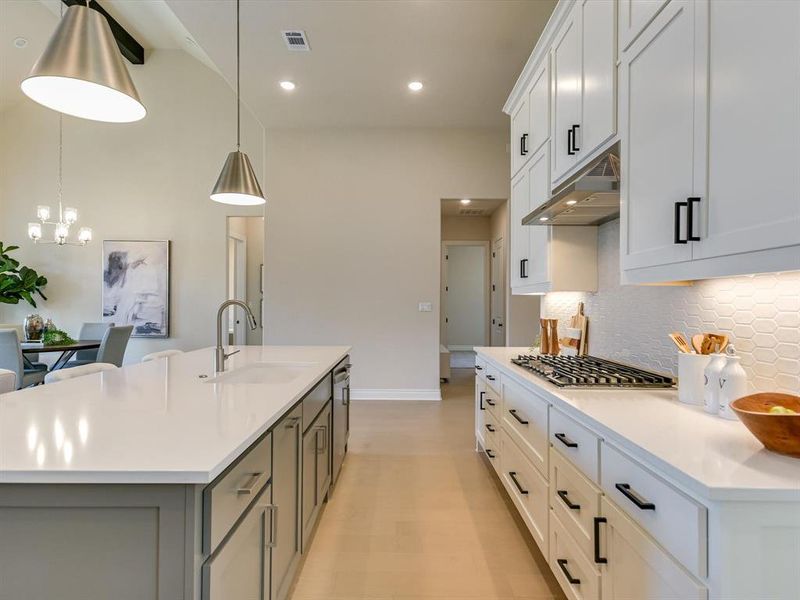 A large kitchen island is perfect for entertaining guests!