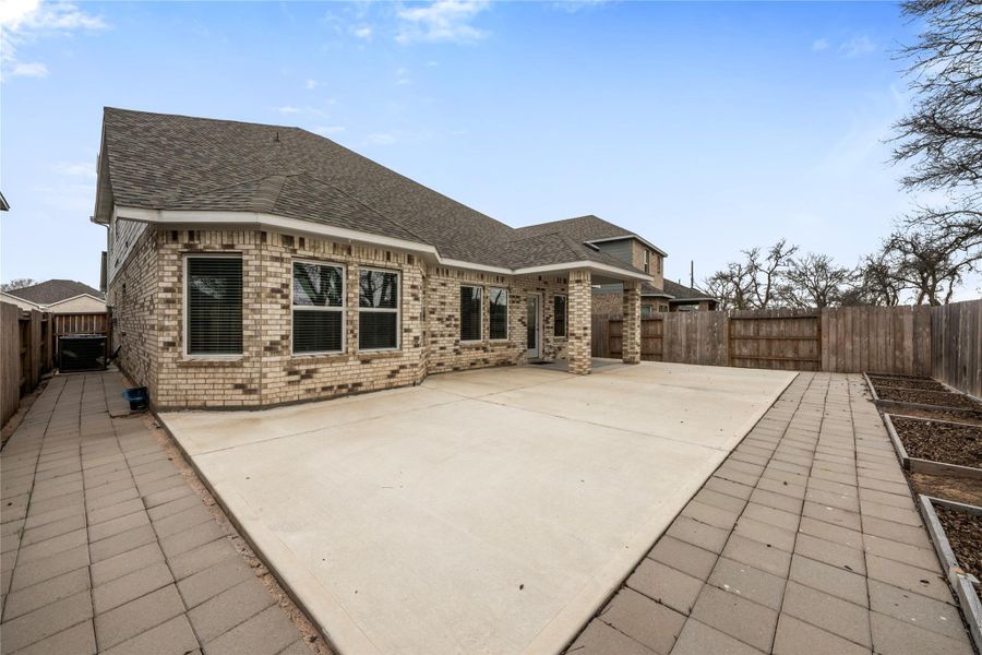 Private backyard space ideal for outdoor relaxation, entertaining, or future customization. A great area to enjoy outdoor activities or create your own personal retreat.