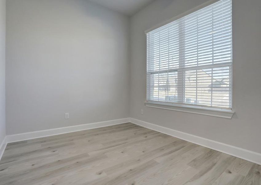 Study located off of the entry with large windows to allow natural light in.