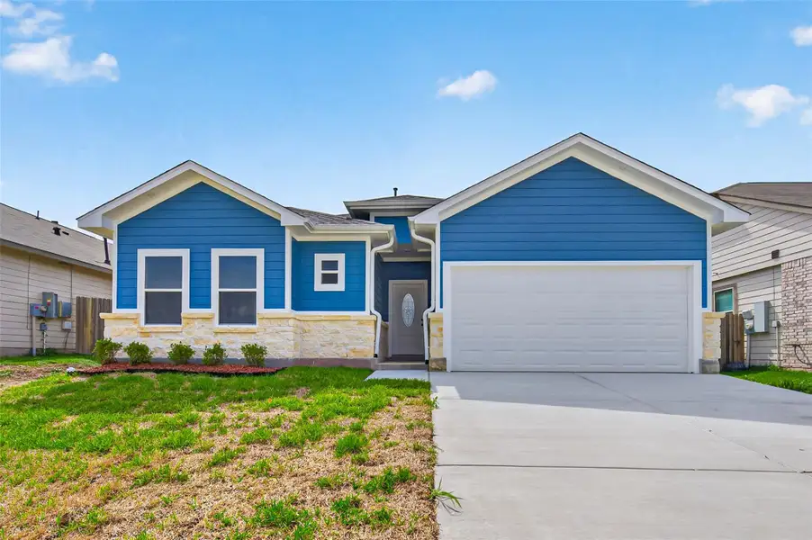 Front exterior of a new home in , Willis, TX, highlighting curb appeal (Image 2). Front exterior of a new home in , Willis, TX, highlighting curb appeal (Image 2).