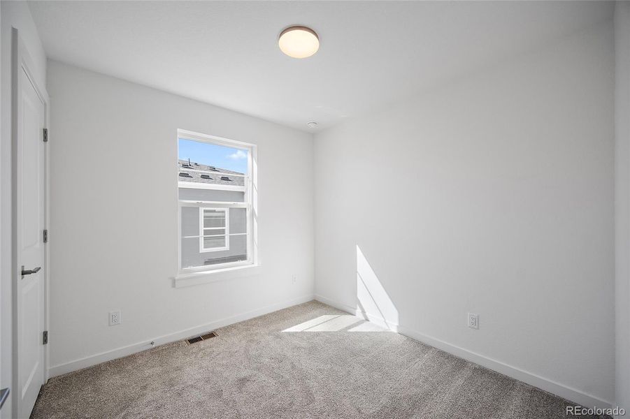 Spacious, unfurnished interior of a new home in The Commons at Victory Ridge, Colorado Springs (Image 19).