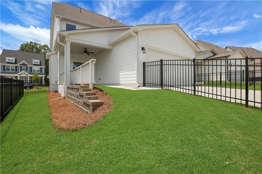 Exterior details and patio area of a home in Marble Tree, Ball Ground (Image 3).