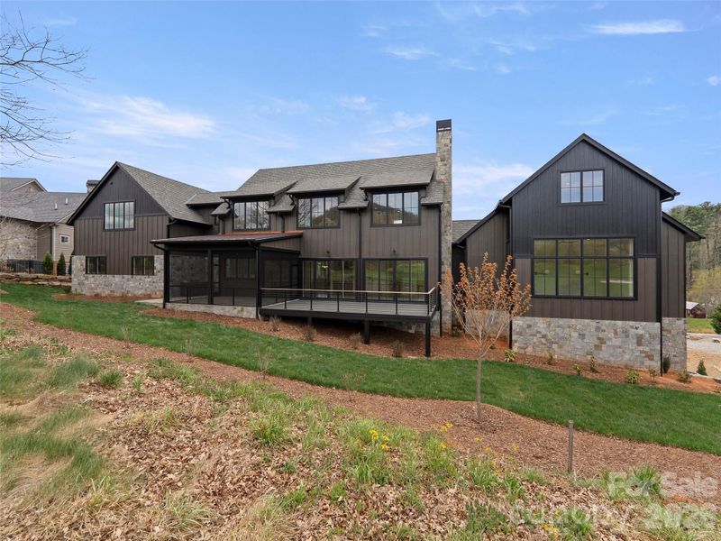 Front exterior of a new home in , Arden, NC, highlighting curb appeal (Image 22).