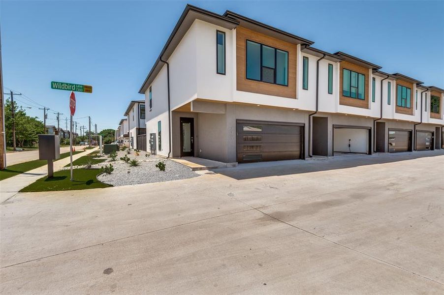 Front exterior of a new home in , Dallas, TX, highlighting curb appeal (Image 24).