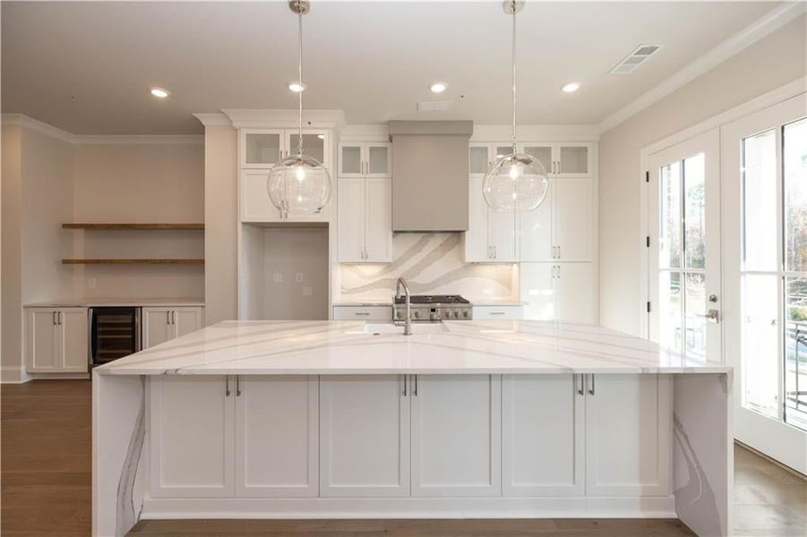 Plenty of storage space and bar area are in each Chamberlain plan - gives you plenty of space to downsize from a larger space. Image is of previously built Chamberlain plan.