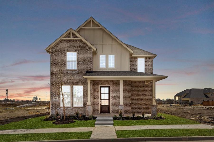 Front exterior of a new home in Edgewater, Fate, TX, highlighting curb appeal (Image 2). Front exterior of a new home in Edgewater, Fate, TX, highlighting curb appeal (Image 2).