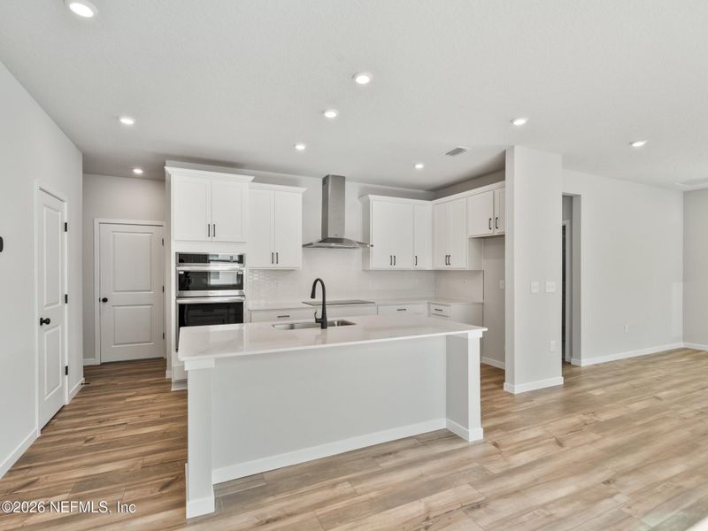 Furnished interior view inside a new home in Seminole Palms, Palm Coast (Image 7).