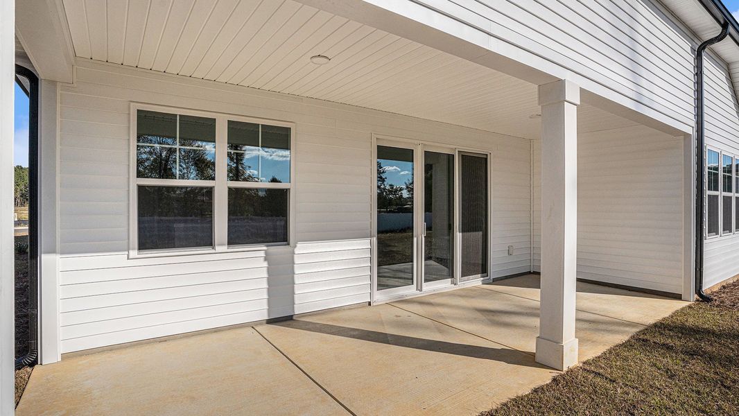 Exterior details and patio area of a home in Coastal Farms, Conway (Image 3). Exterior details and patio area of a home in Coastal Farms, Conway (Image 3).