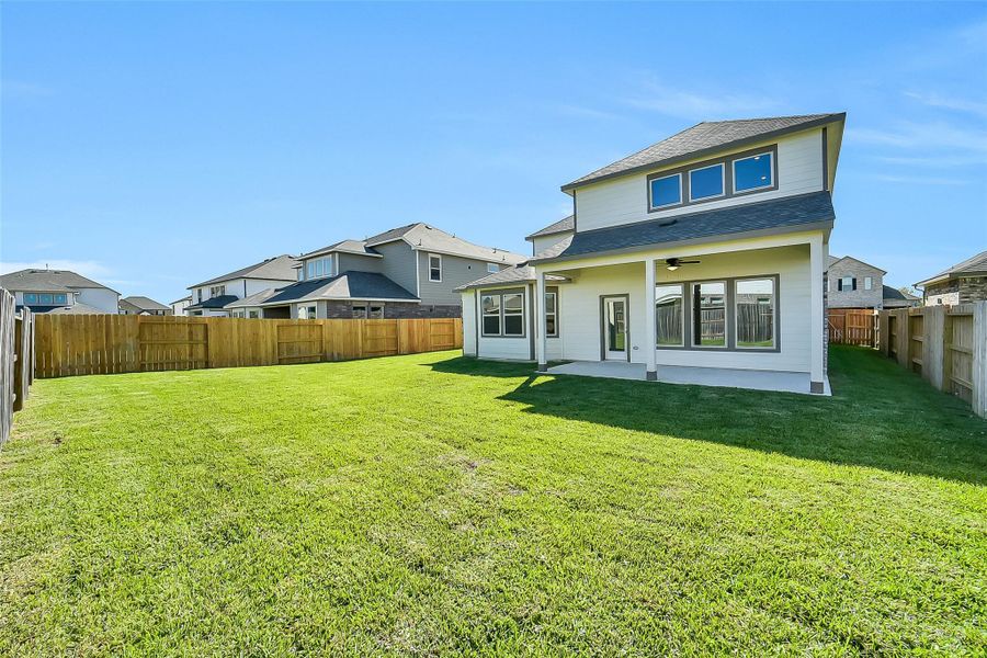 Exterior details and patio area of a home in Stone Creek Ranch, Hockley (Image 4).