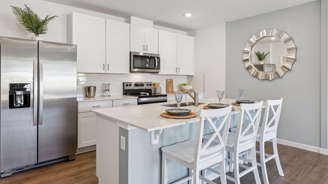 Furnished interior view inside a new home in Halifax Plantation Villas, Ormond Beach (Image 5).