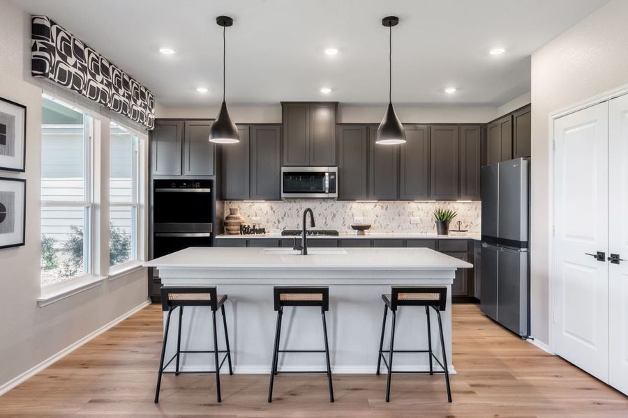 Representative furnished interior of a home built from the 2429 by KB Home in Mustang Valley, Manor (Image 4).