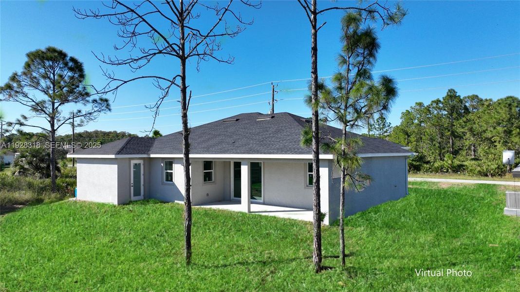 Exterior details and patio area of a home in , Lehigh Acres (Image 21). Exterior details and patio area of a home in , Lehigh Acres (Image 21).