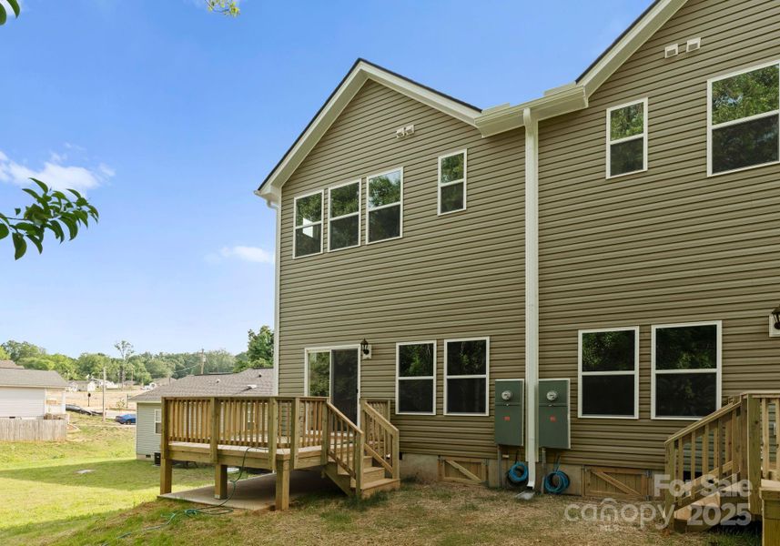 Front exterior of a new home in , Charlotte, NC, highlighting curb appeal (Image 16).